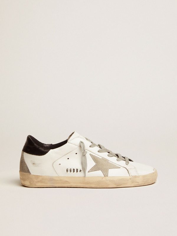 Sup-S sneakers with black heel tab and metal stud lettering