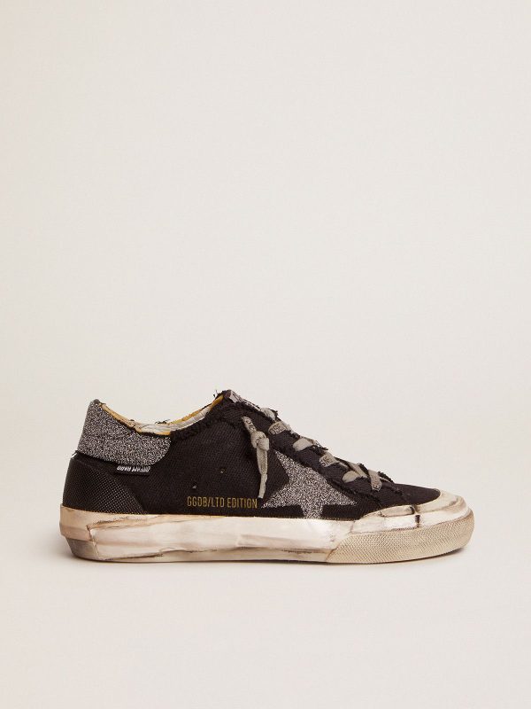 Sup-S Penstar LAB sneakers in black distressed canvas with crystal star and heel tab