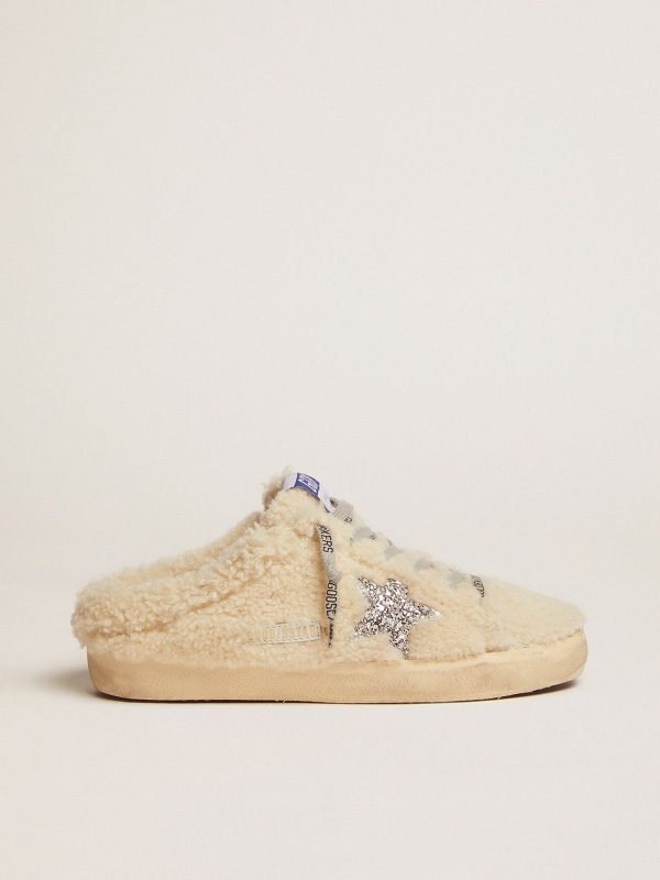 Sup-S Sabots in natural white shearling with silver glitter star